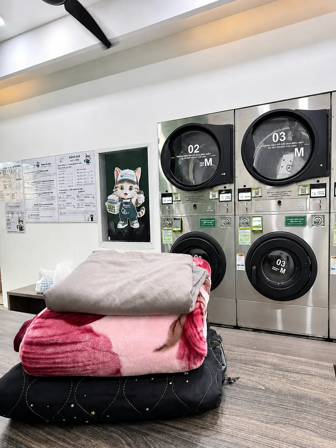 Freshly cleaned blankets at Flower Laundromat Da Nang
